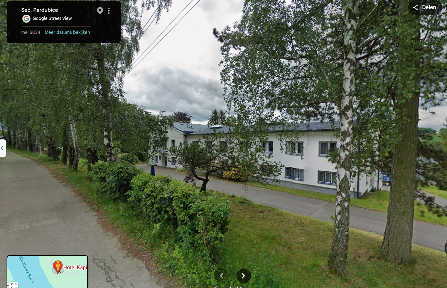 Front of the hotel from the road, user Street View reference